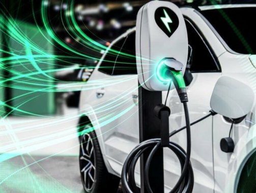 EV charging station for electric car in concept of green energy and eco power produced from sustainable source to supply to charger station in order to reduce CO2 emission .